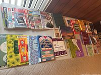 Tabletop view showing magazines, sheet music and books laid out