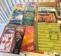 Overview of all books, magazines, songbooks spread on table