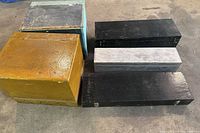 top view of five boxes showing exterior colors and wear