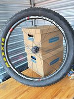 Full view of 27.5+ rear wheel with Maxxis tire mounted on Bravo rim