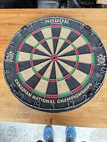 Full view of Nodor Supawire dartboard showing overall design and wear