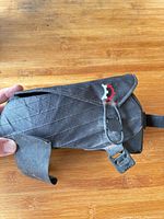 Left side of black Revelate Designs top tube bag