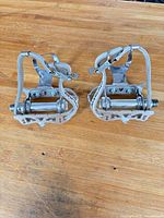 Both Yokota Top-Run pedals with Christophe toe clips and straps