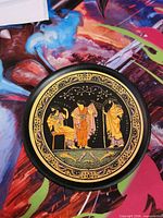 front of plate showing classical Greek design
