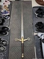 Full view of sword showing length and overall design