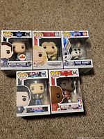 Group shot of all five boxed Funko Pop figures