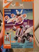 Front of sealed HEXBUG VEX Robotics Explorer Aerial Drone and Rover kit box showing graphics and contents