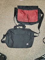 Both messenger bags laid flat showing overall design and color