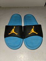 Top view of both slides showing color and logo