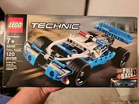 Front of LEGO Technic Police Pursuit box showing age range and piece count
