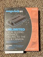 Front of sealed magicJack GO retail box