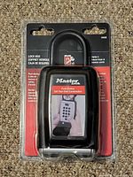 Front of packaged Master Lock 5422D key lock box showing keypad and branding