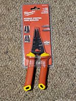 Front view of sealed Milwaukee 48-22-2214 wire stripper in blister pack