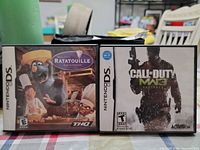 Front covers of both Nintendo DS game cases