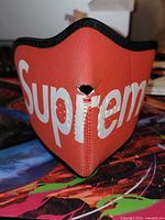 Front view showing Supreme logo and vent hole