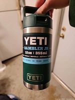 Front view of green YETI Rambler Jr tumbler showing label and capacity