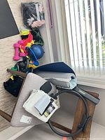 Overview of all fitness items on chair and floor