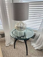 Table and lamp together showing scale and design