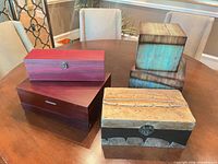 Group shot of all six boxes on table