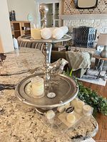 full view of two-tier tray with candles displayed