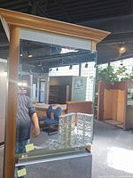 Front view showing mirrored doors and frame