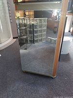 Front view of mirrored medicine cabinet closed