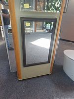 Front view of mirrored cabinet closed