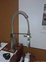 Full view of Grohe Eurocube pull-down faucet on display mount