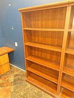 Front view of bookcase showing overall structure and shelves