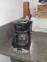 Coffee maker with carafe assembled