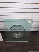 front view of glass vanity top showing integrated basin