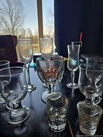 all 10 glassware items displayed on table