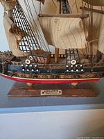 Front starboard view showing hull, sails, stand and Bergantin plaque