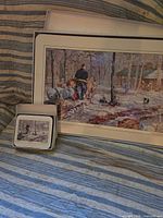 Placemat and coaster boxed sets showing artwork and scale