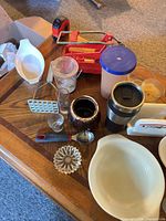 Group shot of assorted kitchen items on table