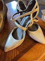 Metallic silver pointed-toe strappy shoes