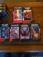 Five Star Trek VHS tapes laid out showing cover art
