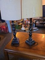 Both table lamps on wooden coffee table