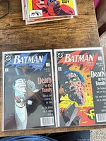 Both bagged and boarded Batman issues 429 and 428 side by side