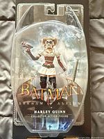 Front view of sealed Batman Arkham Asylum Harley Quinn action figure package