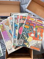 Fan of bagged single-issue comics in storage box
