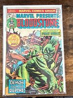 Front cover of Marvel Presents: Bloodstone Issue #1 inside bag showing full artwork and title
