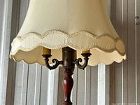 Lamp shade and candelabra arms on turned wood column