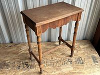 Full view of wood accent table showing overall design