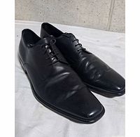 Oblique view of both shoes showing uppers and lacing