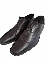 Front angled view of both shoes showing leather quality and lacing