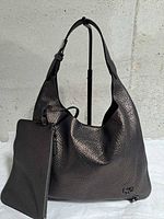 Front view of Givenchy metallic hobo bag with attached pouch