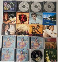 Overhead view of all 20 CD cases and discs