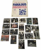 Front of sheet-music booklet and all nineteen photo cards displayed face up