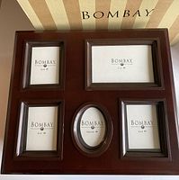 Top view of box showing five-opening picture frame insert and Bombay sample cards